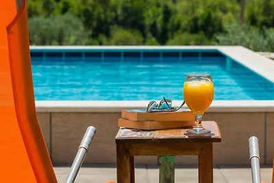 Villa Harmonia con patio e piscina in comune