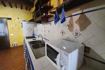 Attraente casa vacanze con piscina in comune