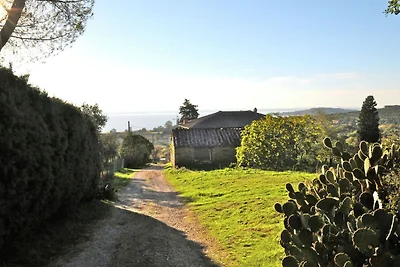 Cottage rustico a Magione con giardino