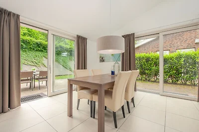 Bungalow moderno con lavatrice nel verde