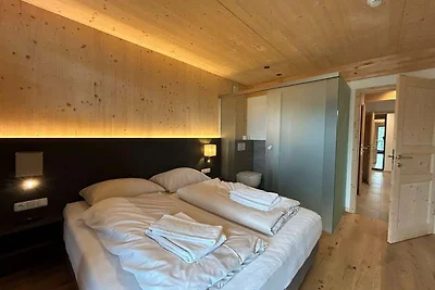 Chalet con vasca idromassaggio sul balcone