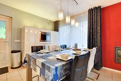 Ferienhaus mit einer überdachten Terrasse