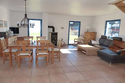 Casa de vacaciones con techo de paja y vistas...