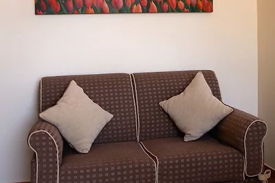 Appartamento con piscina e parcheggio