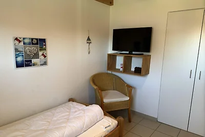 Ferienhaus mit Kaminofen in Burhave