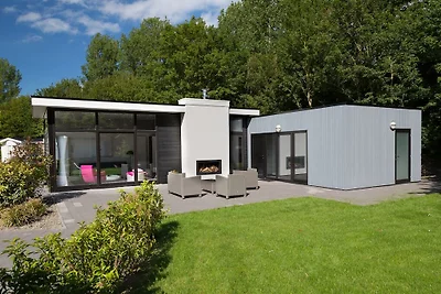 Chalet con caminetto in un villaggio vacanze