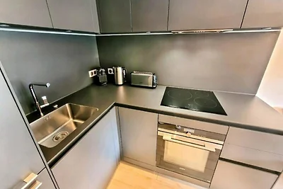 Apartment in den Alpen mit privatem Garten