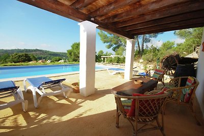 Holiday in true Ibiza style between hills wit...