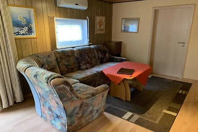 Houten vakantiehuis met wintertuin