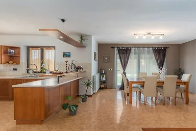 Holiday home in Tinjan with swimming pool