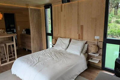 Ferienhaus an einem privaten Teich mit Blick ...