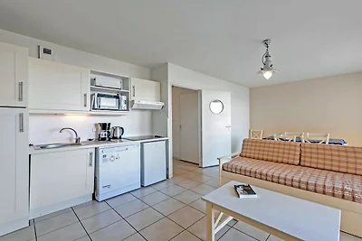 Strandappartement met zwembad