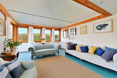 Cottage sul fiume con vista sull'estuario