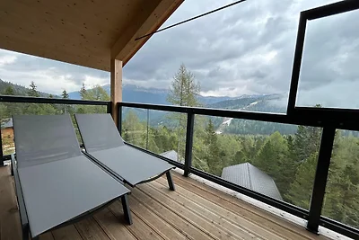 Chalet mit Sauna auf dem Balkon