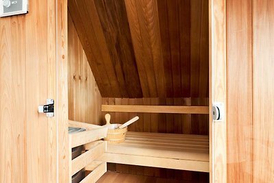 Nette vakantiewoning met buitenspa en sauna