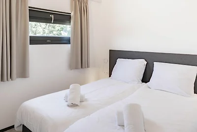 Lodge con finestra sul tetto sul Brielse Meer