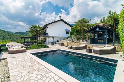 Ferienhaus mit privatem Pool und Meerblick