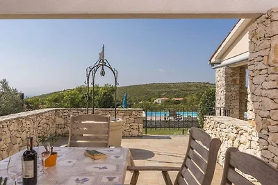 Villa en Koromacno con piscina
