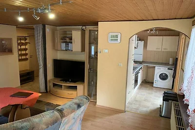 Houten vakantiehuis met wintertuin