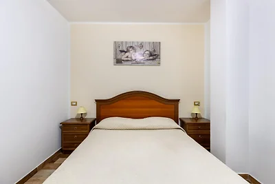 Wohnung mit Veranda und privatem Parkplatz