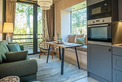 Accogliente cottage nel bosco di Belvilla