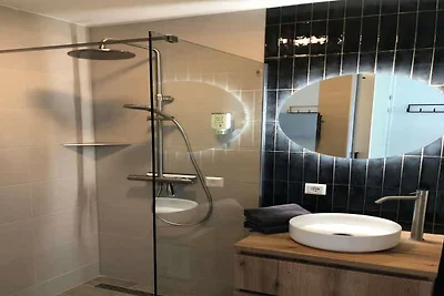 Lodge im 2. Stock mit Blick auf die Dünen.