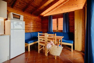 Attraente bungalow, terrazza coperta, a 1 km ...