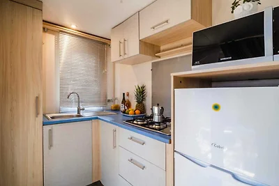 Mobilhome im Ferienpark mit grosser...