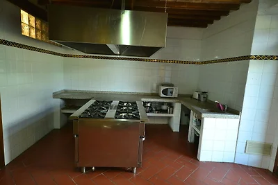 Ferienhaus in Chianni mit Garten