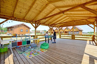 Holzbungalow in Mielenko mit Spielplatz für...