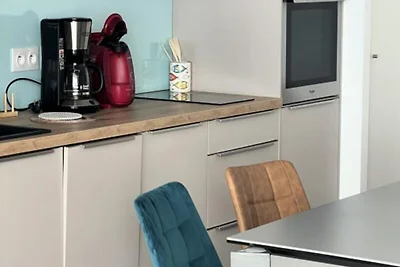 Wohnung in Grau du Roi am Strand