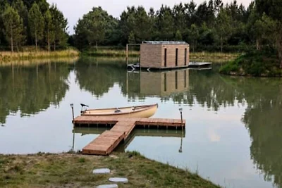 Ferienhaus an einem privaten Teich mit Blick ...