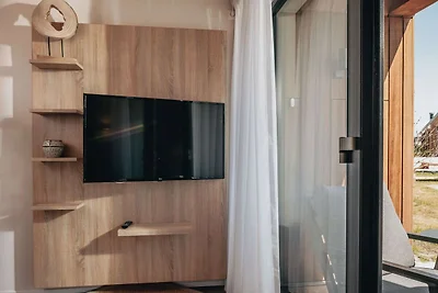 Modernes Tiny House mit Spülmaschine, Strand ...