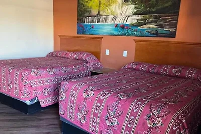2 queensize bedden, rokersgedeelte