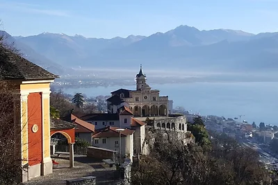Holiday home in Magadino with swimming pool