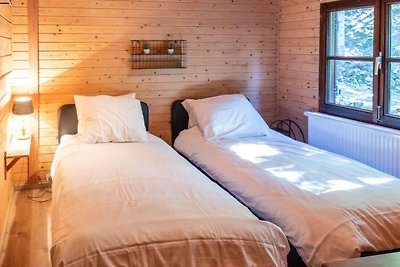 Chalet im Wald mit Whirlpool und Sauna