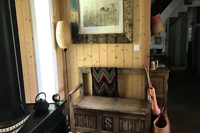 Huis in dennenbos met omheinde tuin