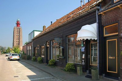 Studio met terras bij strand