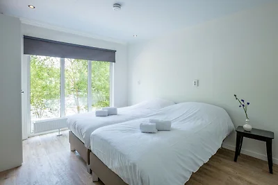 Bella casa con la sua spiaggia sabbiosa