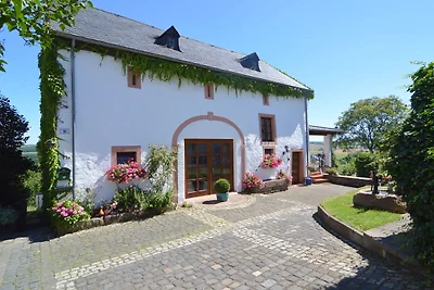 Casa di vacanza con balcone nell'Ittel Eifel
