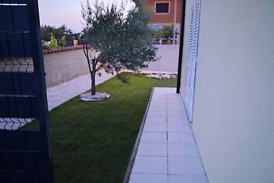 Casa de vacaciones en Buje con piscina.