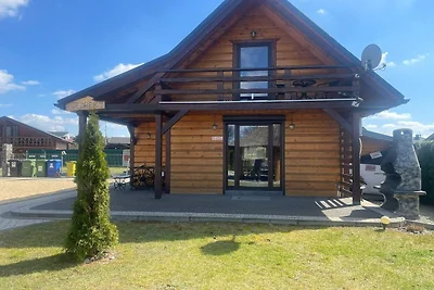 Ein hölzernes Ferienhaus im Highlander-Stil