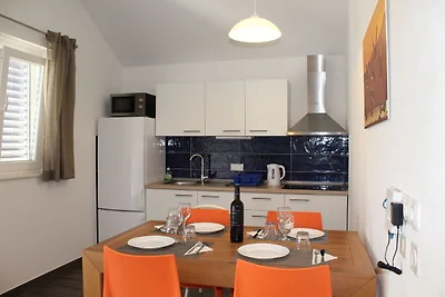 Apartment in Veli Rat mit Dachterrasse