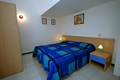 Terraced house with communal pool