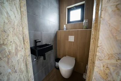 Chalet moderno sul fiume Mosa
