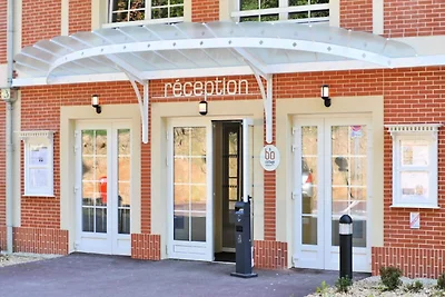 Wohnung in Bagnoles mit Wasserkomplex