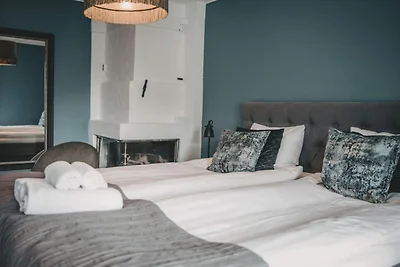 Uitnodigende hotelkamer met gratis ontbijt