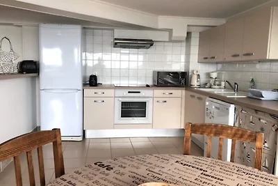 Wohnung und Blick auf den Privatstrand.