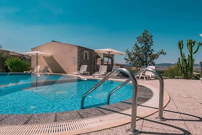 Appartamento a Badus con piscina comune