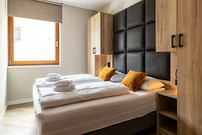 Elegante appartamento con sauna, area sciisti...